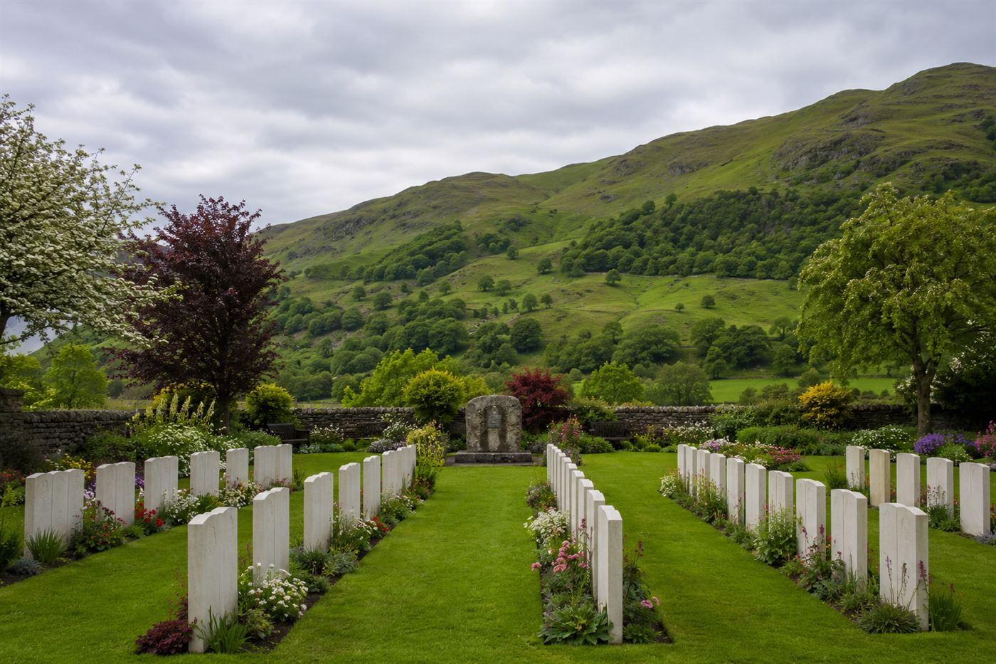A peaceful memorial garden in a Welsh valley with rows of white stone grave markers in neat lines, flowers laid at the graves, green hillside behind under a soft grey sky, Aberfan disaster memorial site