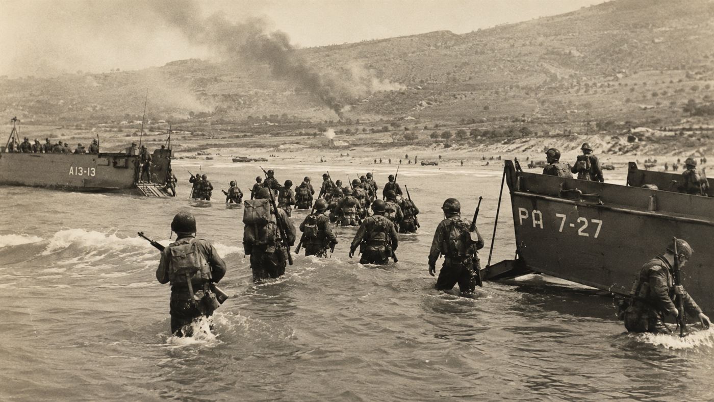 Allied troops wading ashore during the July 1943 amphibious landing on Sicily