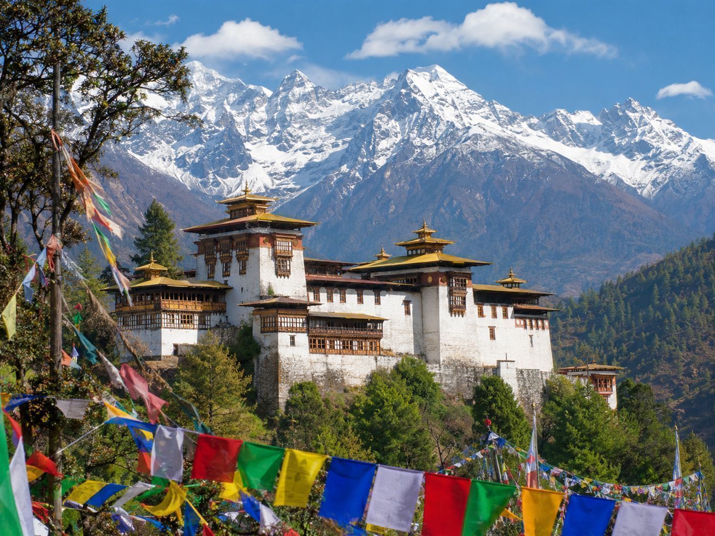 A traditional Bhutanese dzong in the Himalayas, symbol of the kingdom of Gross National Happiness