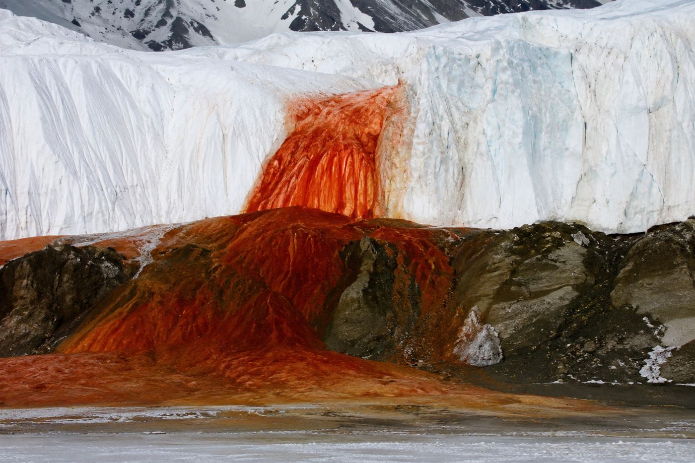 Blood Falls, a red iron stain pouring down the white Taylor Glacier in Antarctica