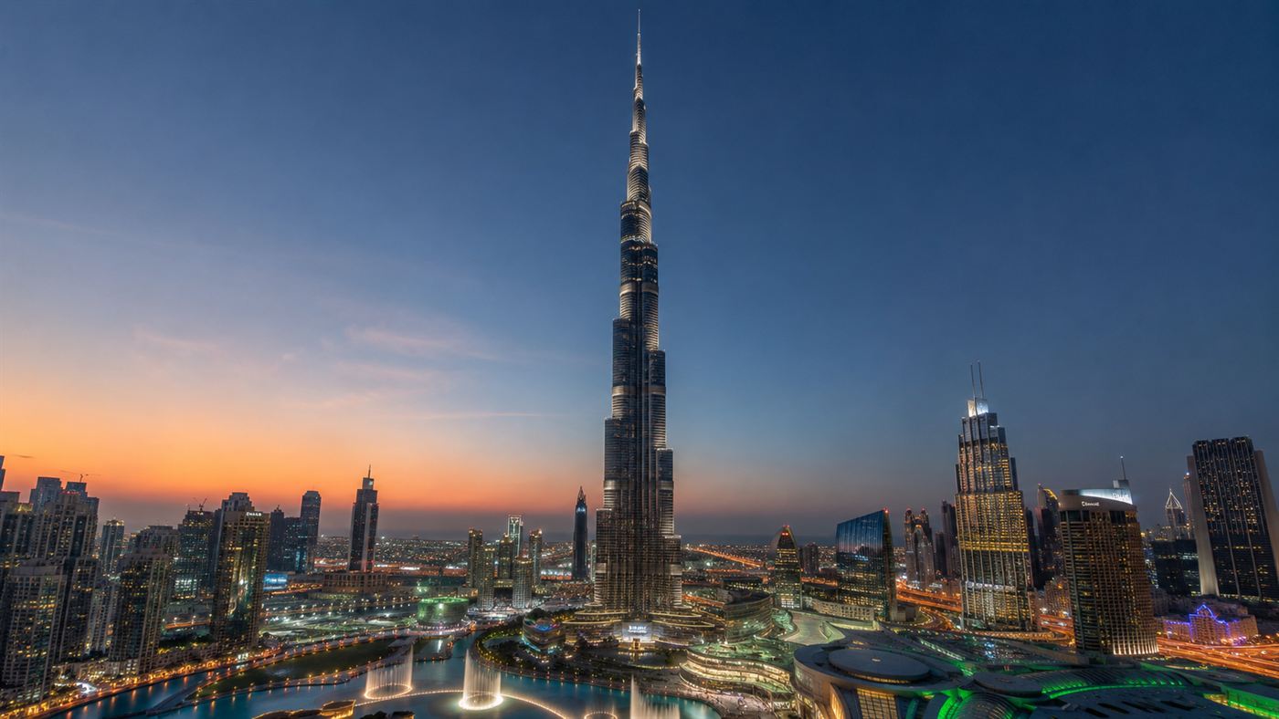 The Burj Khalifa towering over the Dubai skyline at dusk, the world's tallest building