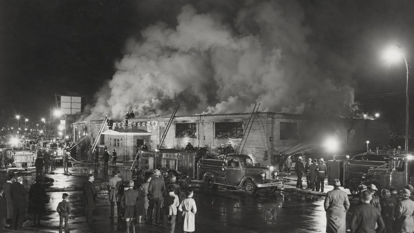 Firefighters outside the burning Cocoanut Grove, the deadly 1942 Boston nightclub fire