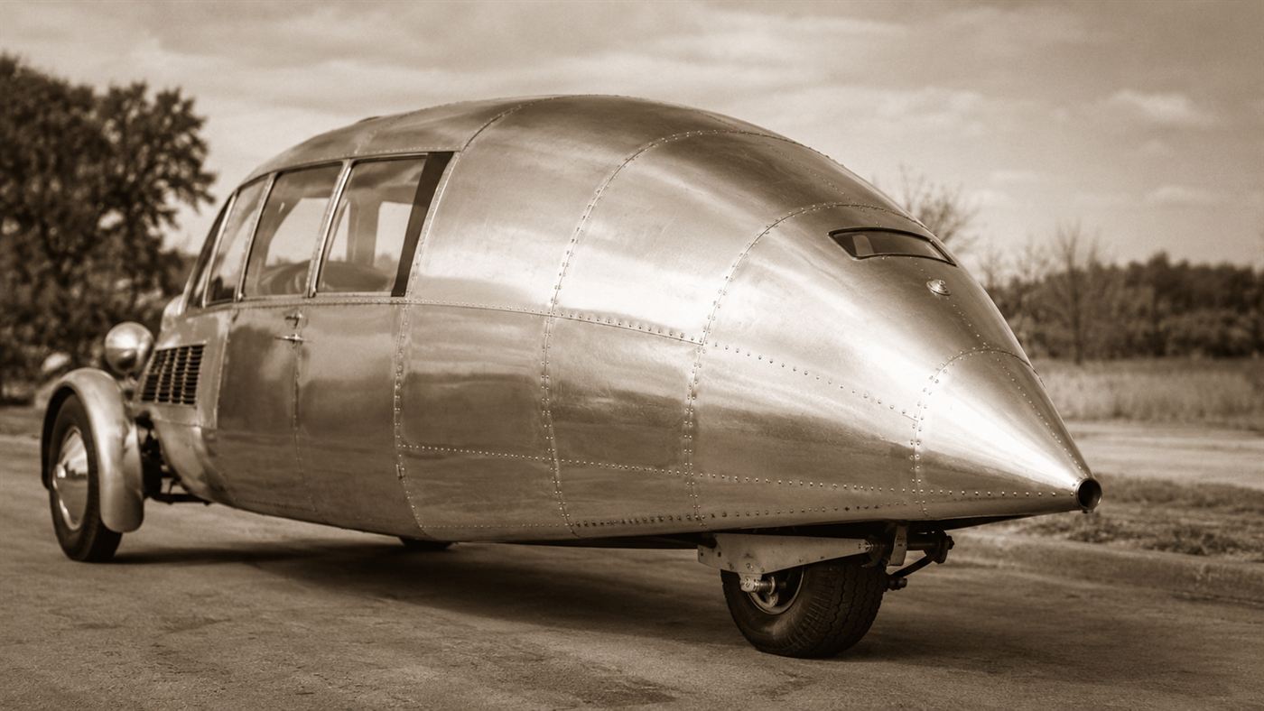 A detail view of the single rear steering wheel and tapered aluminium tail of the 1933 Dymaxion car