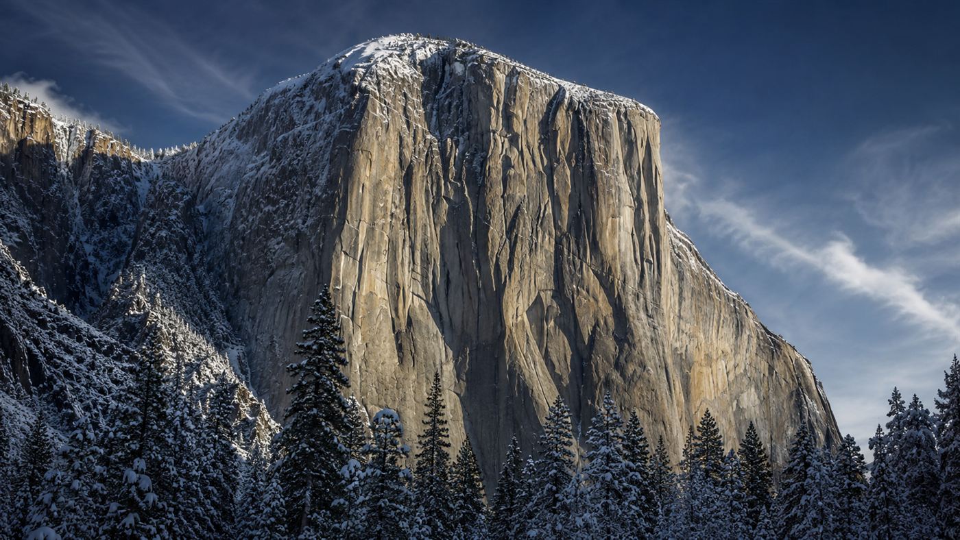 The sheer granite face of El Capitan in Yosemite under a winter sky, the setting for the natural firefall on Horsetail Fall