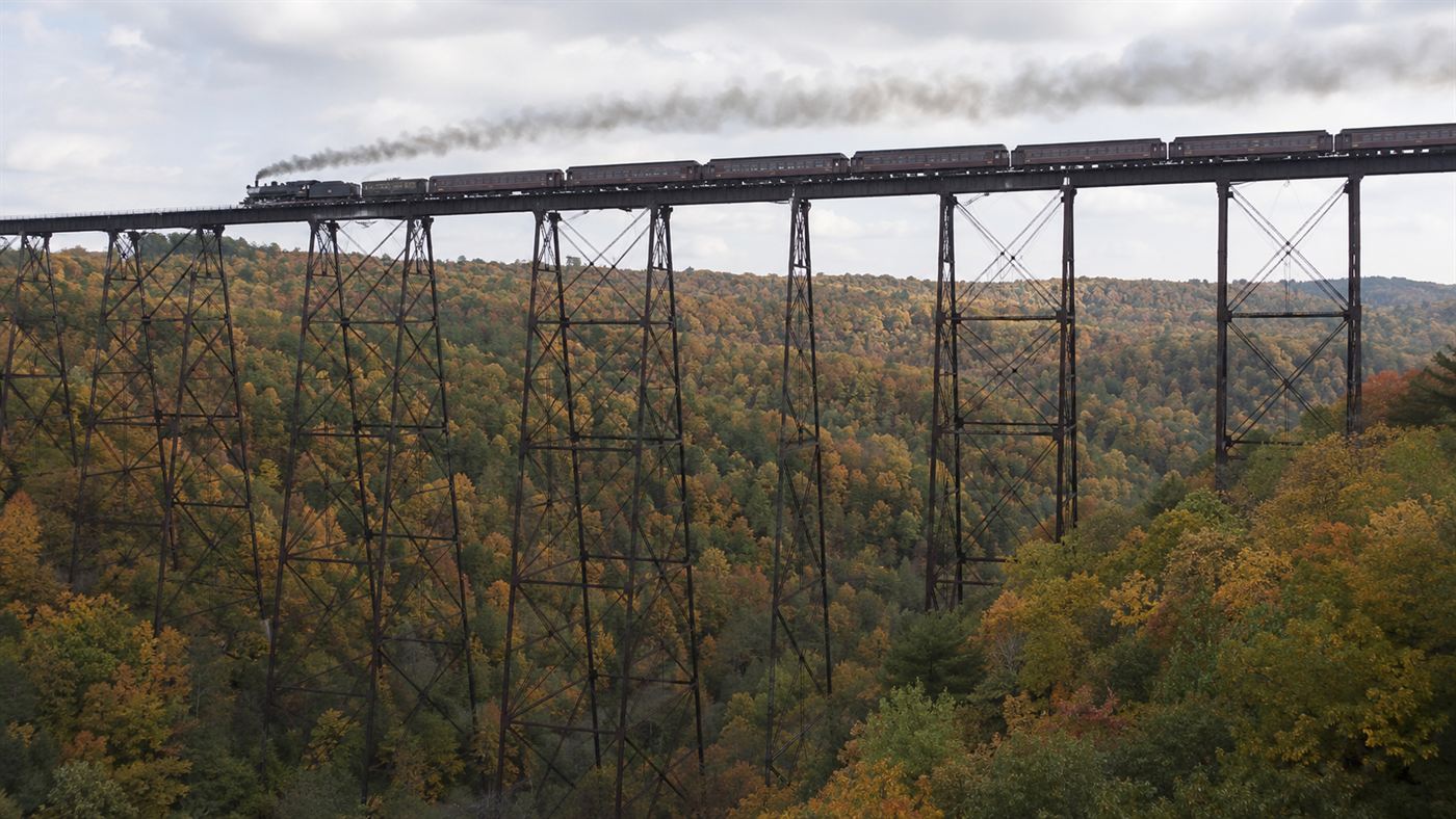 The Kinzua Bridge, a towering iron railroad viaduct spanning a forested Pennsylvania gorge