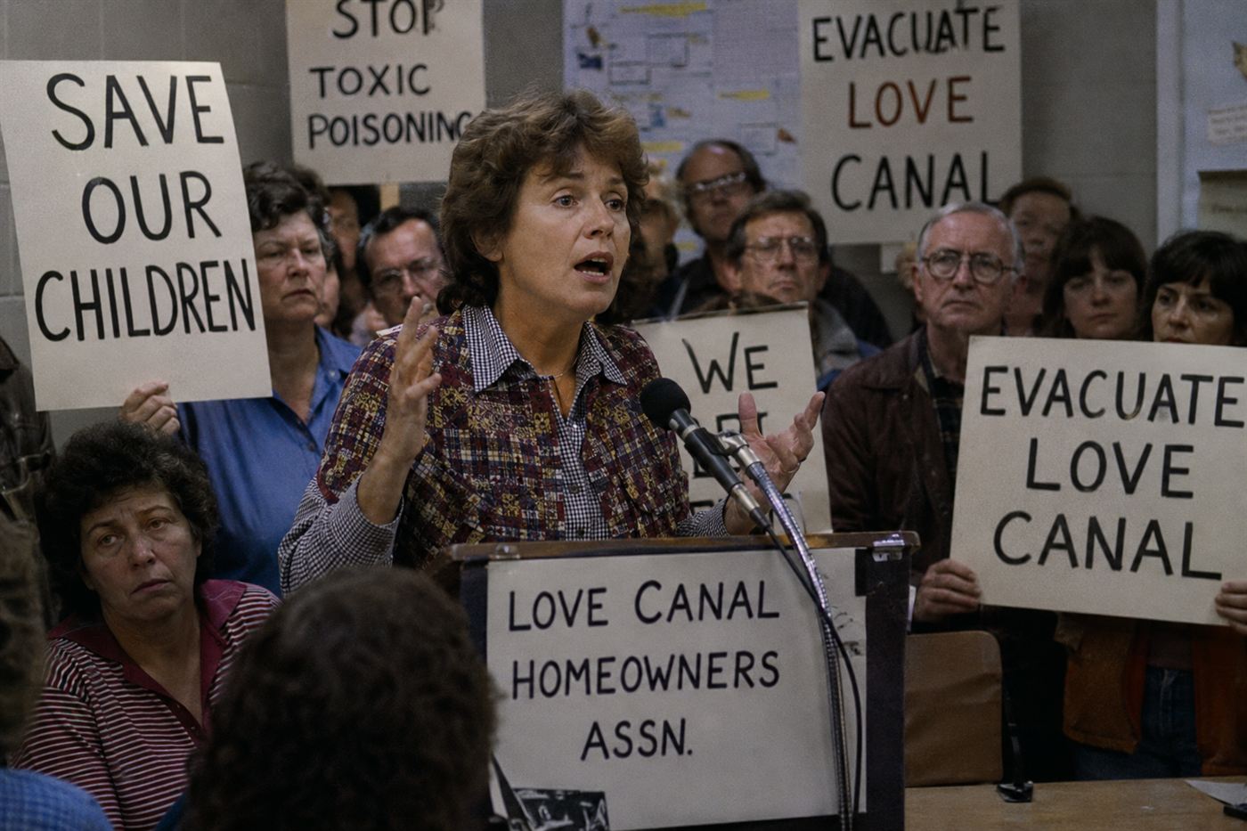Lois Gibbs at Love Canal neighborhood protest 1978 Niagara Falls, community activists holding signs demanding evacuation of toxic waste neighborhood, Love Canal Homeowners Association