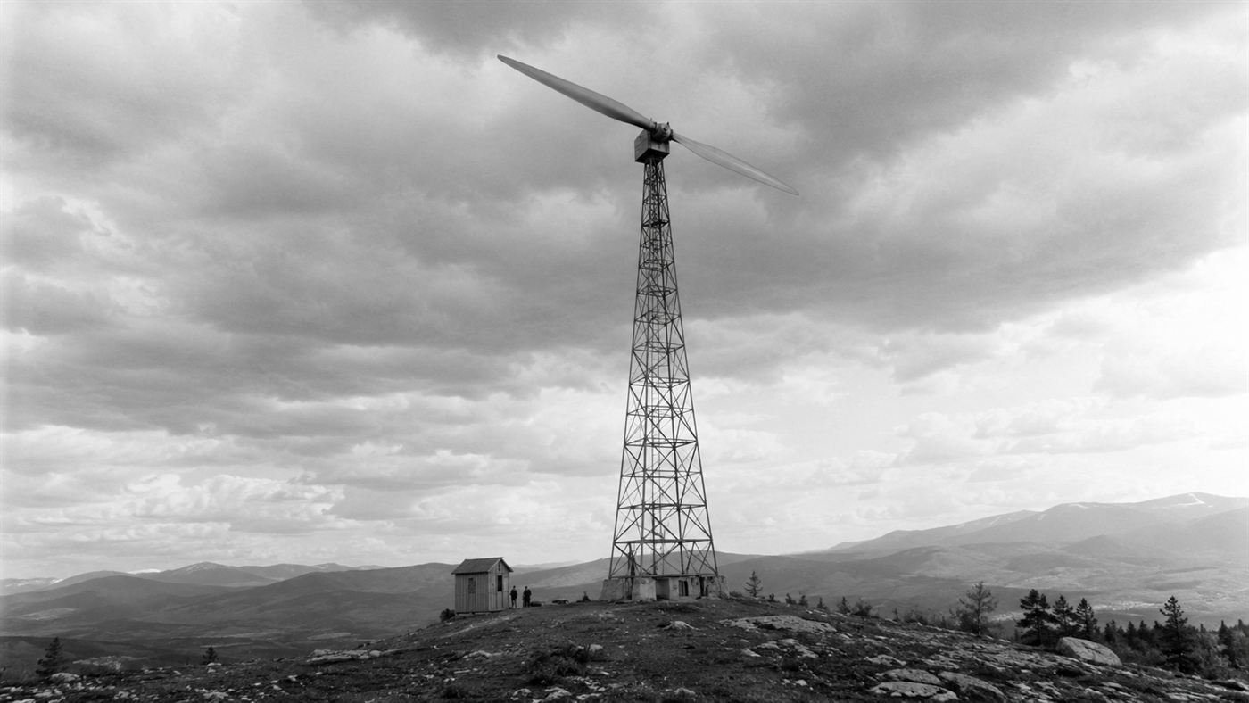 The Smith-Putnam wind turbine, a huge two-bladed steel machine on a lattice tower on a Vermont hilltop in 1941