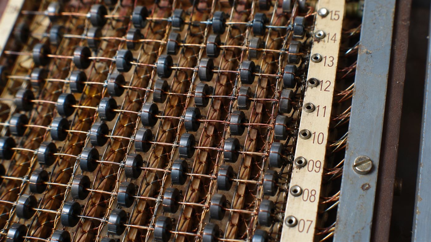 A close-up of the Apollo Guidance Computer and its hand-woven core rope memory of wires and magnetic rings