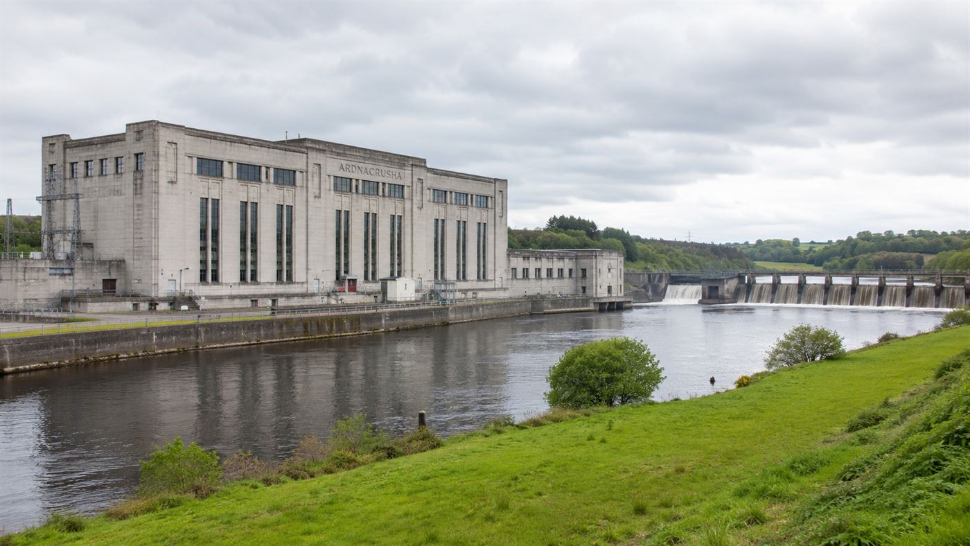 The Ardnacrusha hydroelectric power station, a 1920s concrete power house beside a canal on the River Shannon in Ireland