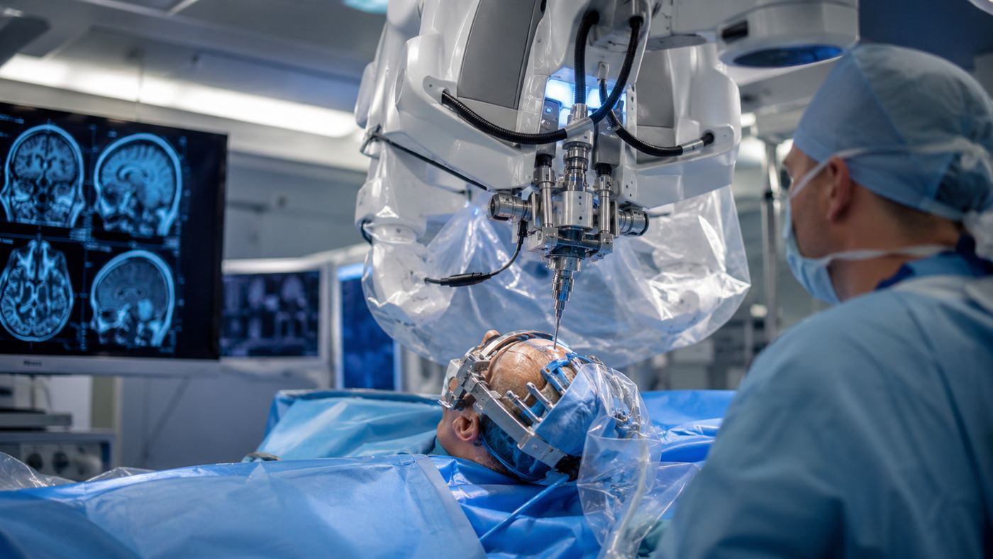 A precise surgical robot positioned over a patient to place a brain implant, in a clean modern operating room
