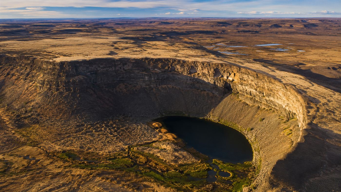 An aerial view of Dry Falls in the Channeled Scablands of eastern Washington, a vast dry cataract carved by Ice Age floods
