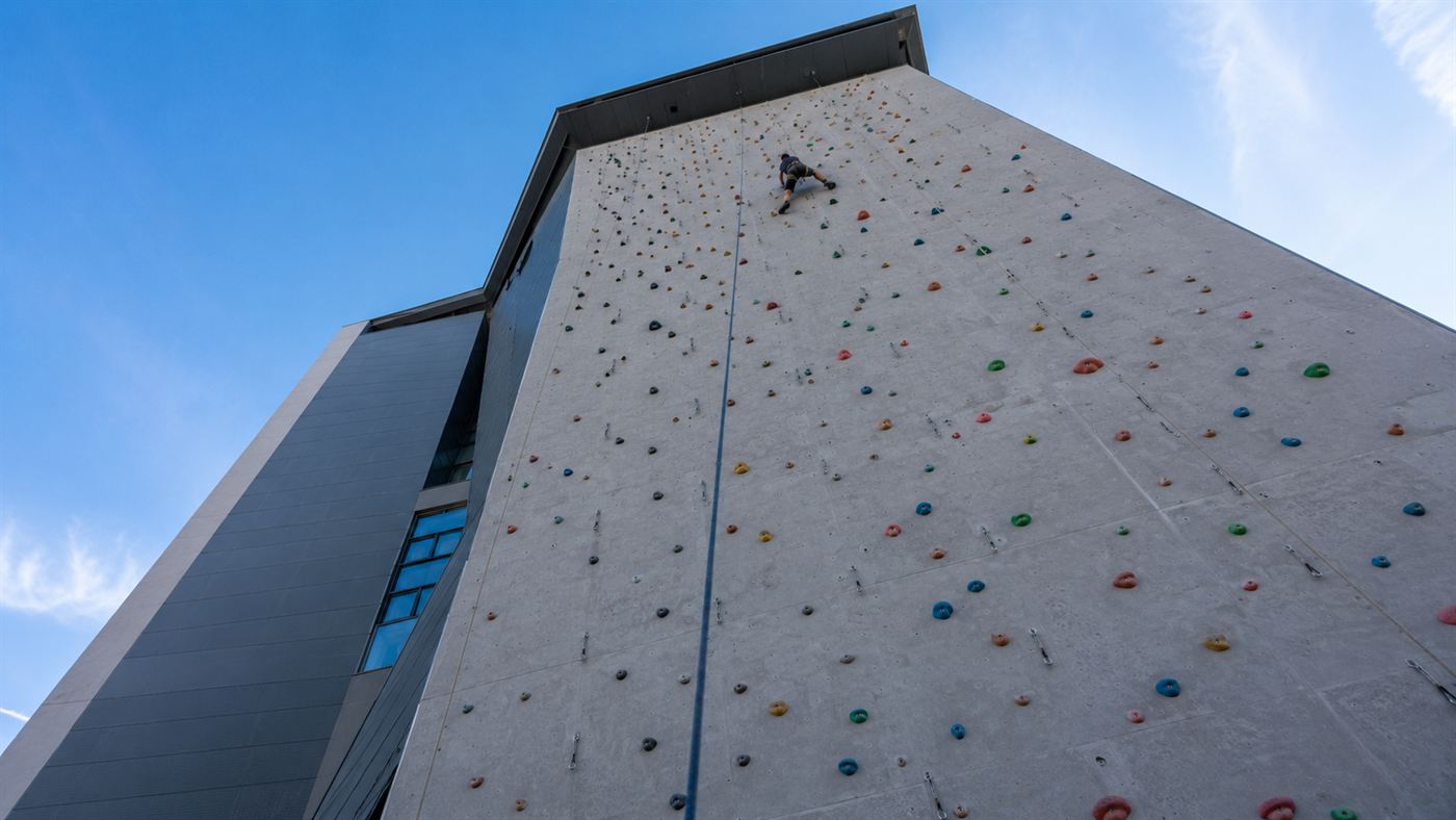 The tall climbing wall on the vertical side of CopenHill, the Amager Bakke waste-to-energy plant