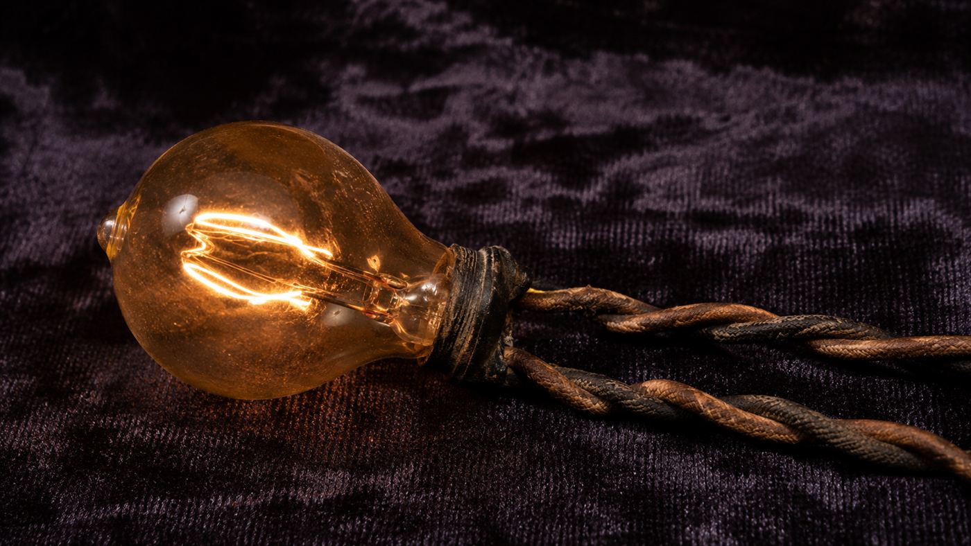 An early 1880s walnut-sized incandescent bulb of the kind used for the first electric Christmas lights