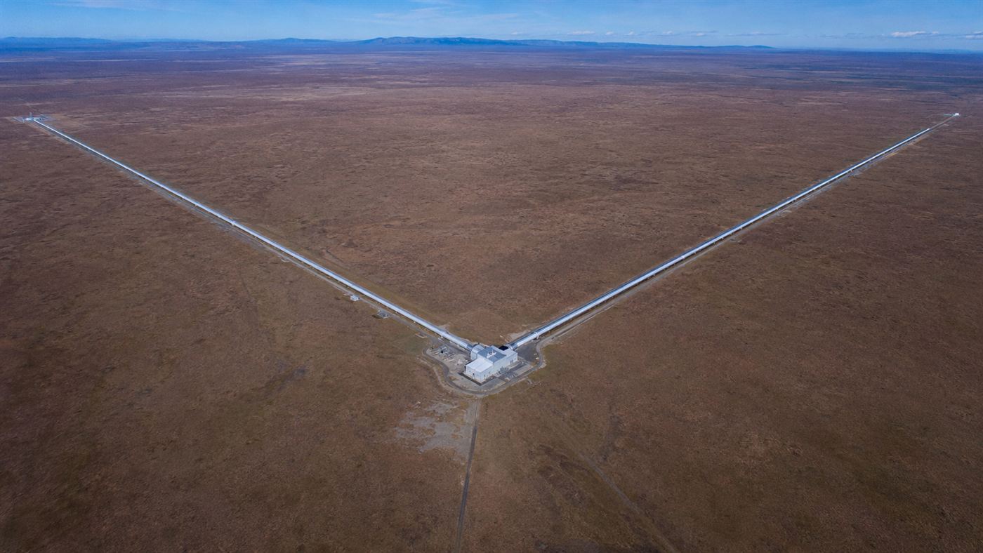 An aerial view of the L-shaped LIGO gravitational waves observatory with two 4-kilometre arms meeting at a right angle