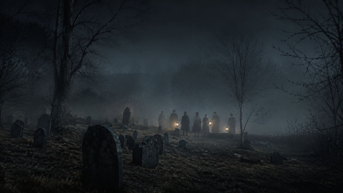 Townspeople holding lanterns among gravestones in a foggy nineteenth-century New England cemetery at night, seen from a distance