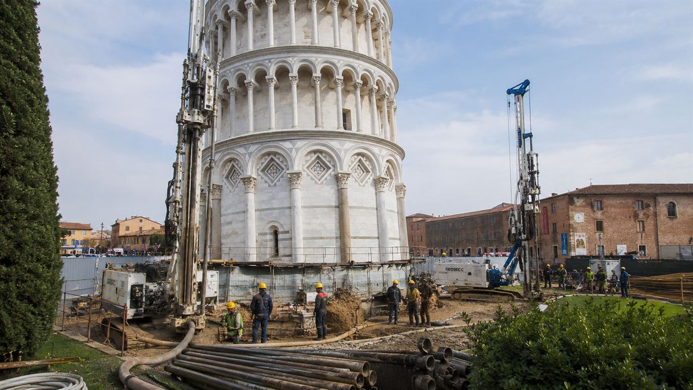 Engineering equipment and drilling rigs working at the foundation of the leaning tower