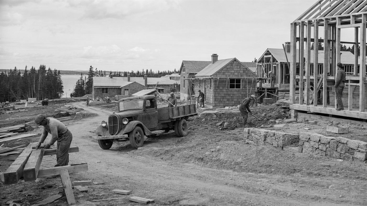 1930s workers and wooden buildings under construction at Quoddy Village near Eastport, Maine