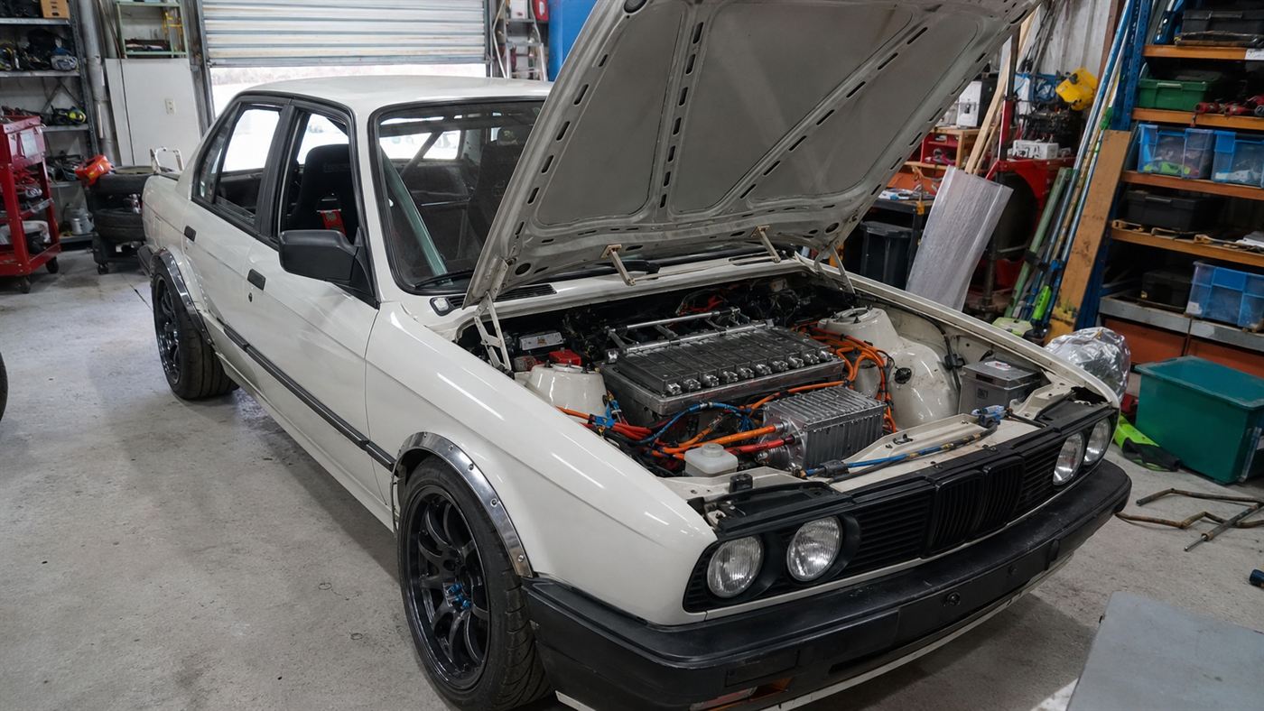 A modified 1980s BMW E30 converted to electric power, like the Green Monster Mate Rimac built in his garage