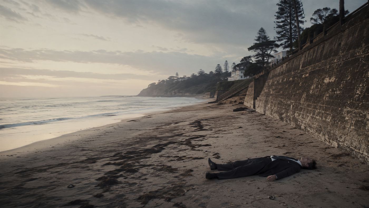 A well-dressed man lying still on a deserted Australian beach at dawn in 1948, evoking the Somerton Man case