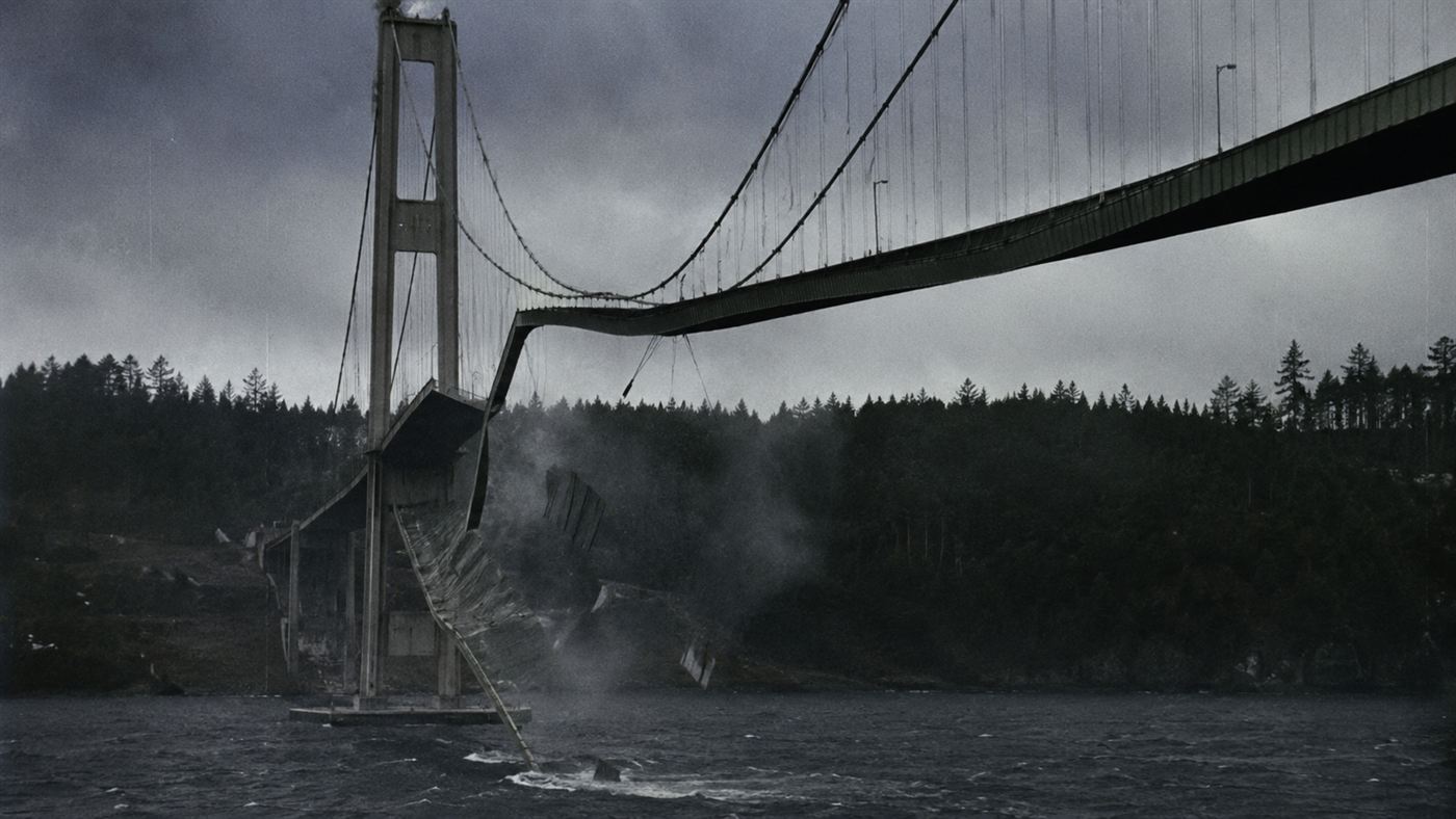 The Tacoma Narrows Bridge twisting violently in the wind moments before it collapsed into Puget Sound in November 1940