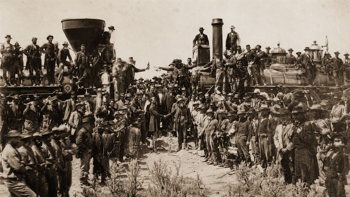 The 1869 golden spike ceremony completing the Transcontinental Railroad, with two locomotives meeting at Promontory
