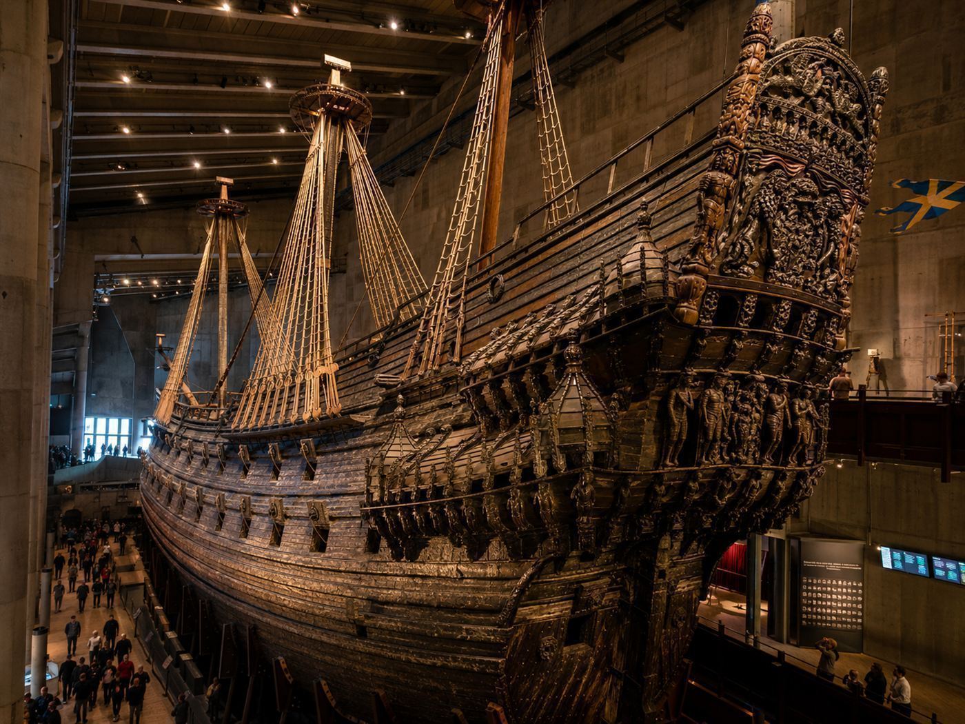 The Vasa warship preserved and raised in the Vasa Museum in Stockholm, the massive dark oak hull towering above visitors in the exhibition hall