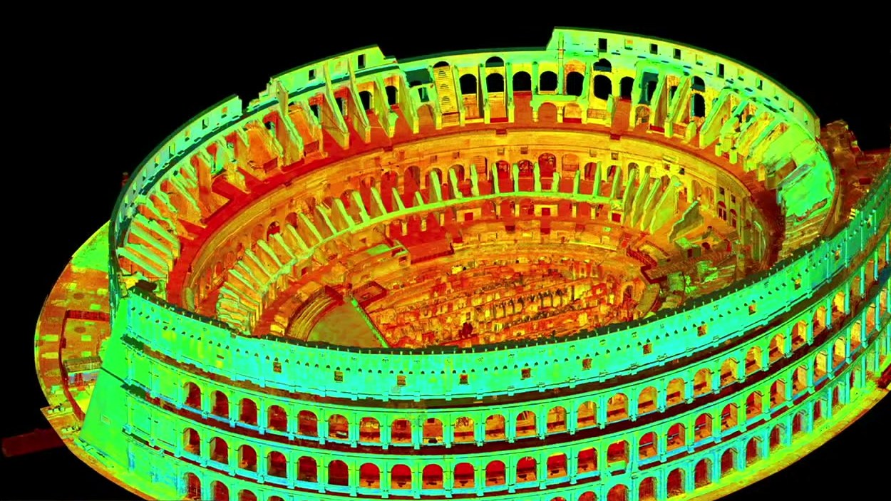 Coliseu em nuvem de pontos a laser: o anfiteatro inteiro visto de cima, colorido em verde, amarelo e vermelho, com as arquibancadas e os arcos externos