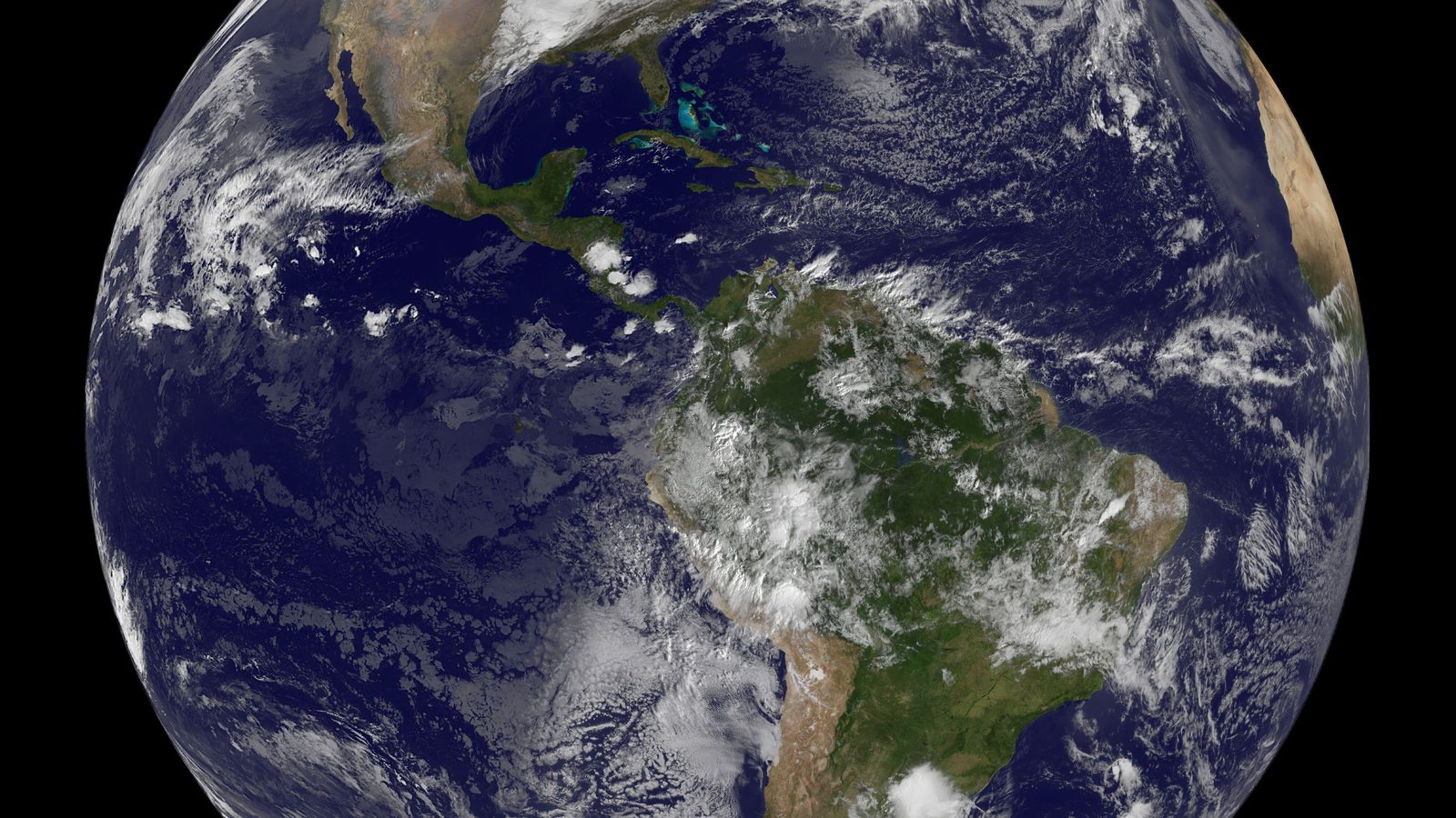 Planeta Terra visto do satélite GOES-13 no solstício de dezembro de 2011, com a América do Sul no centro, quando as estações do ano se invertem entre os hemisférios